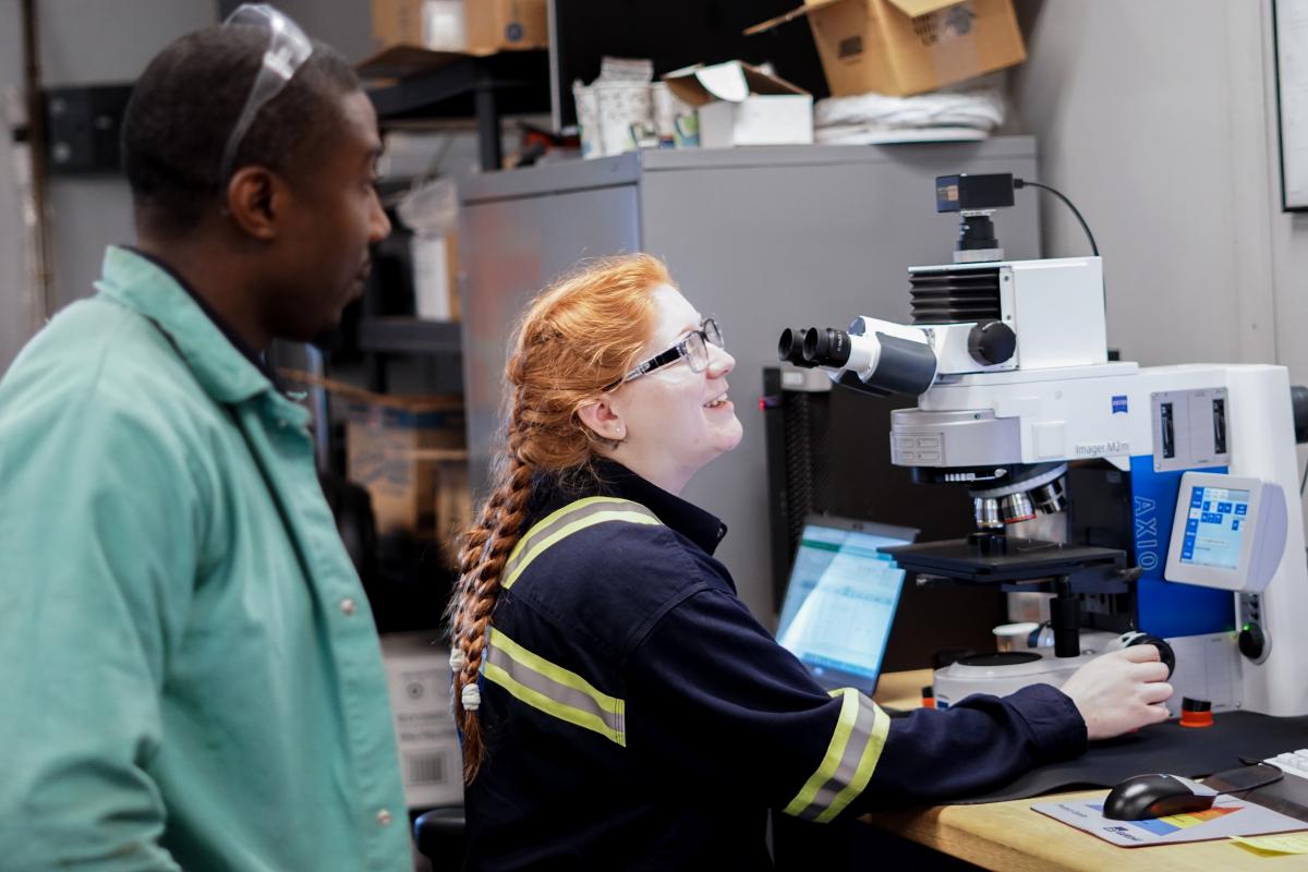 Williams and Wunderlich using microscope